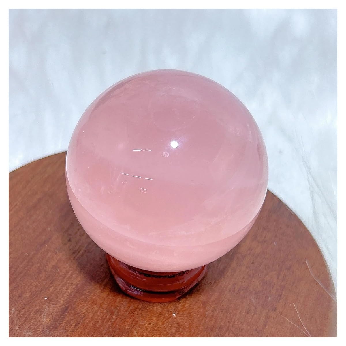 Cuarzo rosa esférico de 53mm para reducir el estrés visual en oficinas