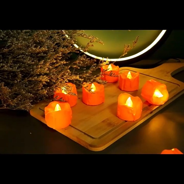 Image of 12 Pcs Orange Melting Timer Tea Light Candles Battery Operated