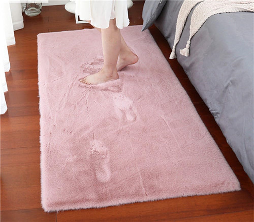 Tapis lavable en machine rose pour salon chaleureux et sans taches