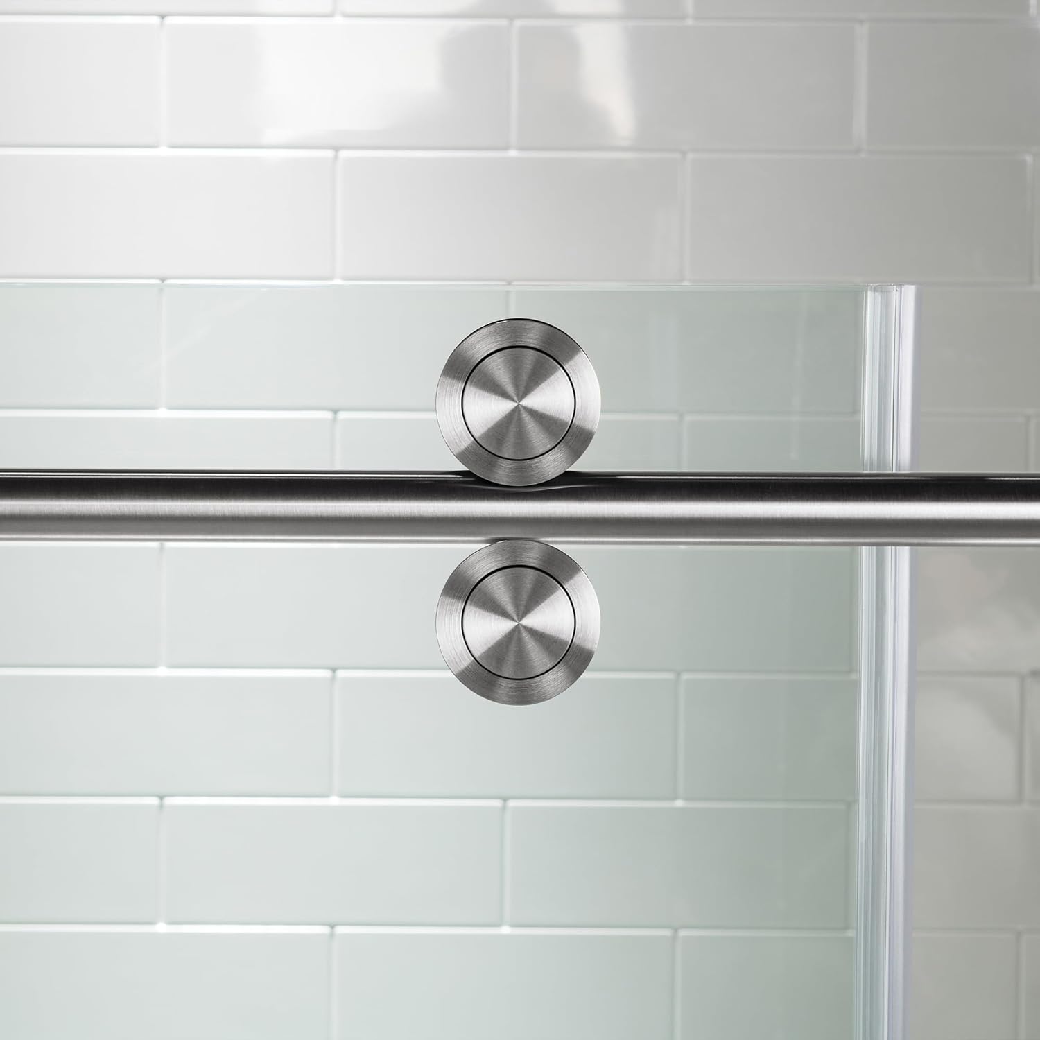 Close-up of a single shower door roller
