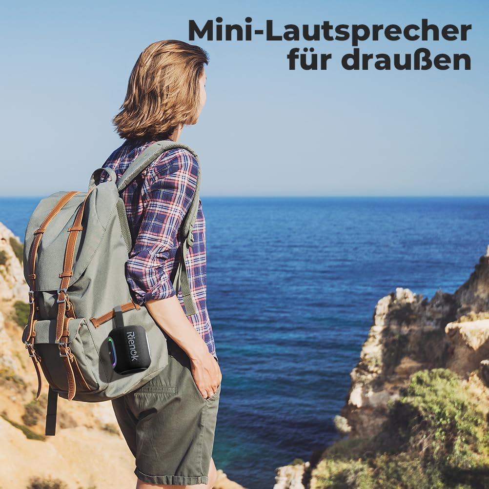 A person hiking with the RIENOK speaker attached to their backpack, demonstrating its portability for outdoor activities.