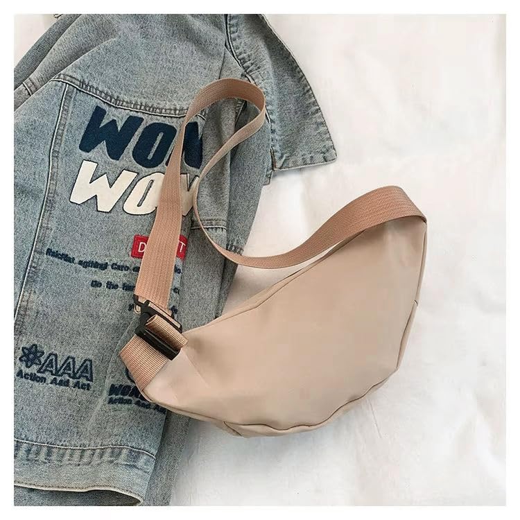 Image of Wildhorn Stylish Unisex Crossbody Waist Bag | Water-Resistant Sling & Chest Bag with Adjustable Strap | Compact Travel & Daily Essentials Bag (Khaki)