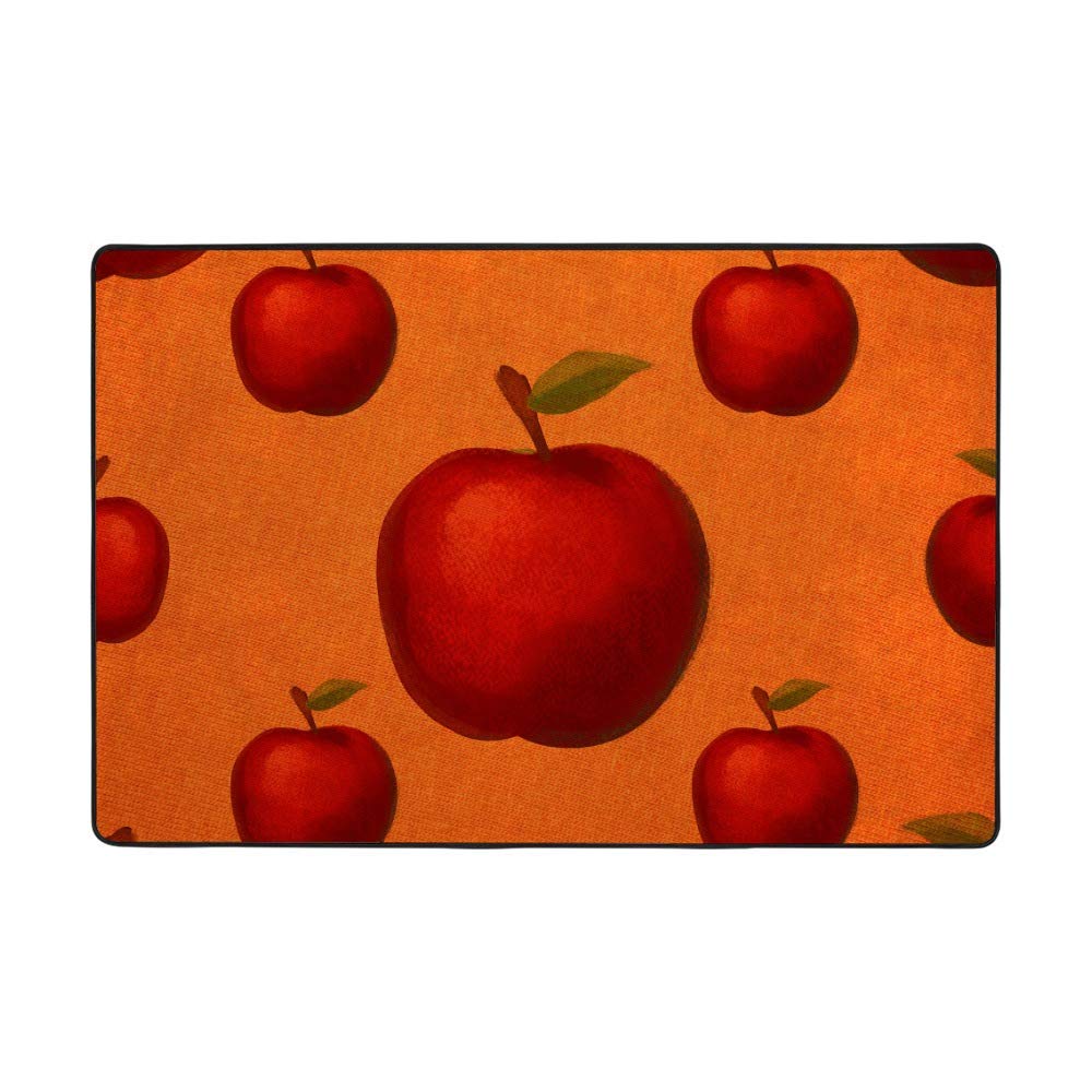 Tapis salon velours rouge corail moelleux pour créer un coin lecture cosy
