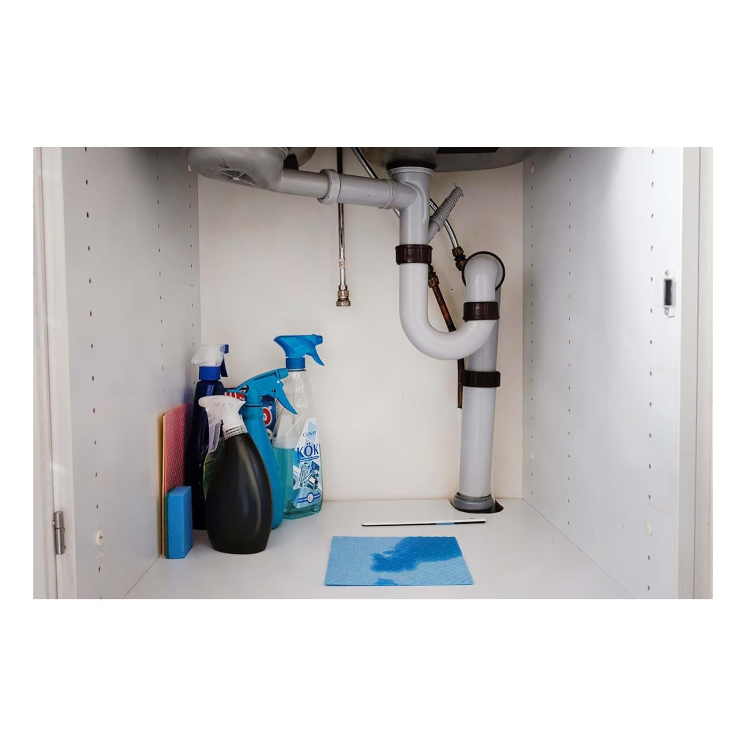 Sensative Strips Drip sensor placed under a washing machine