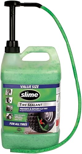 Slime 10009 - Sellador de reparación de pinchazos de neumáticos planos, evita y repara, todos los neumáticos sin cámara fuera de carretera, botella