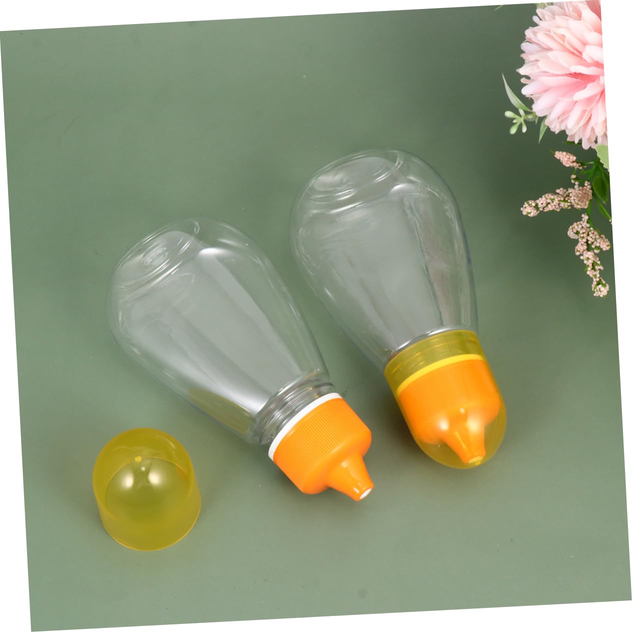 GLEAVI 4Pcs Transparent Honey Bottle Capacity Plastic Liquid Storage Jars with Lid Portable Food Packaging for Home Travel and Picnic Use for Honey Jam and Salad
