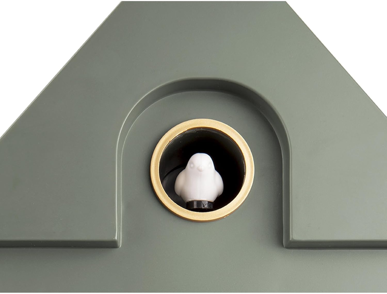 Close-up view of the cuckoo bird emerging from its house on the clock