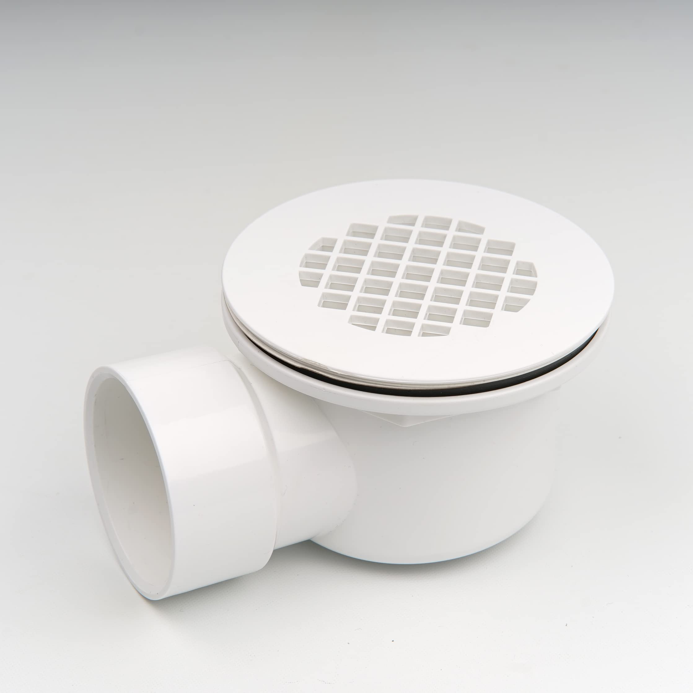 Scarico doccia a basso profilo da 5,1 cm con riduttore da 5,1 cm x 1-1/2" e filtro perforato, scarico laterale in PVC per base doccia e scarico di ricambio