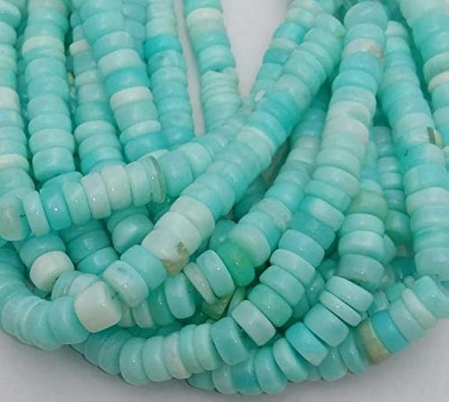 Perles opale péruvienne heishi bleu ciel pour créer vos bijoux bohèmes d'été