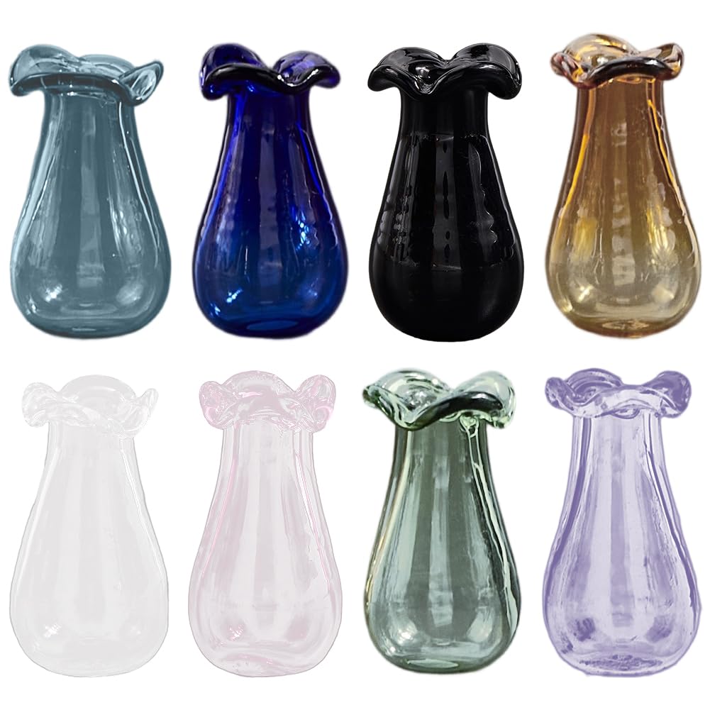 Petits pots en verre colorés pour ranger les moustaches de votre chat sans les perdre
