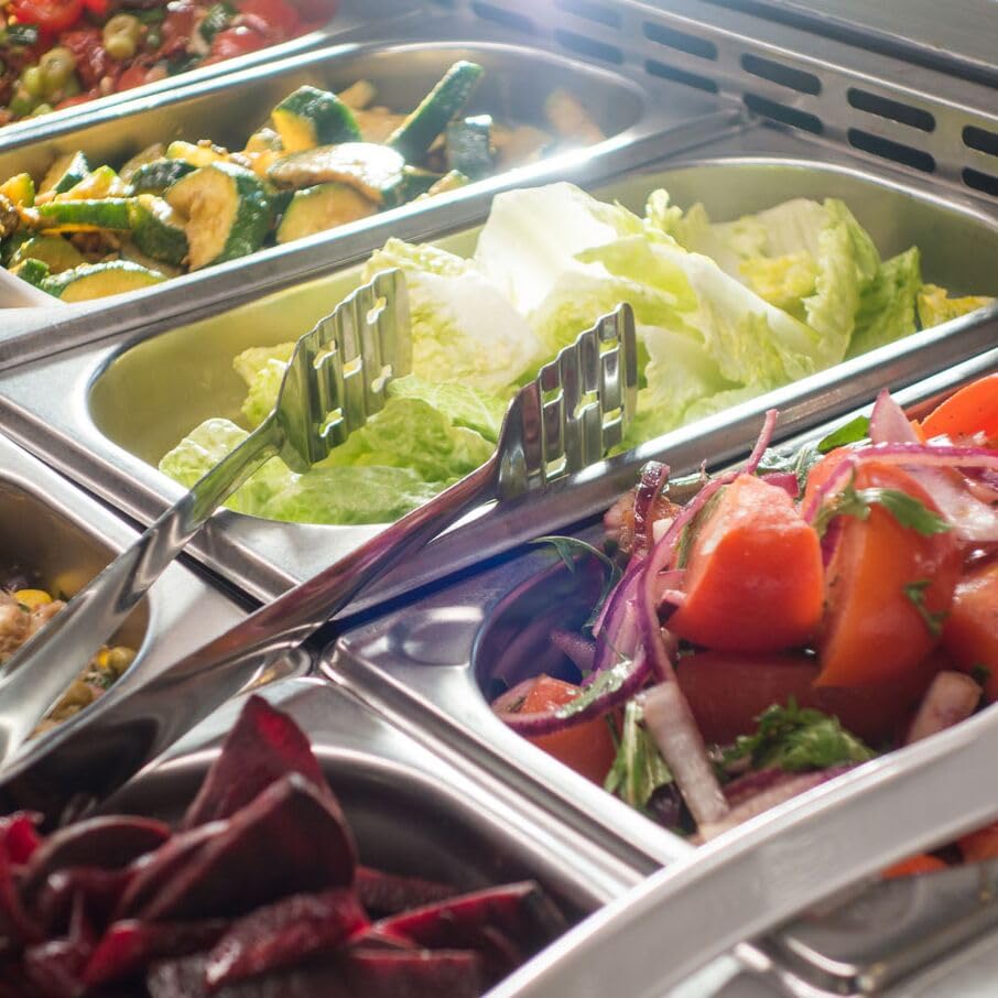 Food items displayed in GN containers within the refrigerated unit