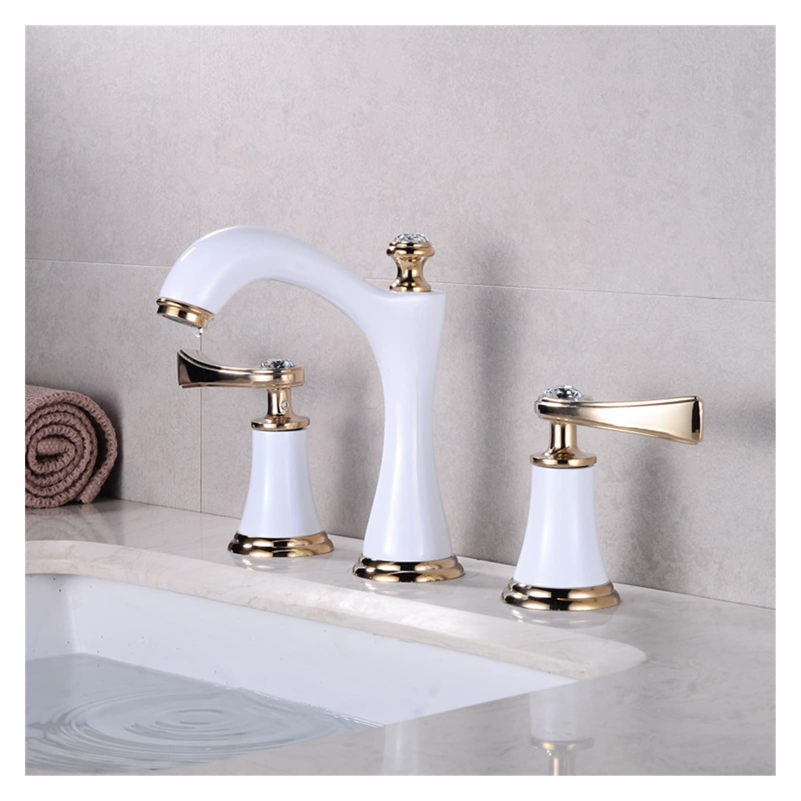 Grifo de lavabo en latón negro y dorado con tres orificios y doble mandos
