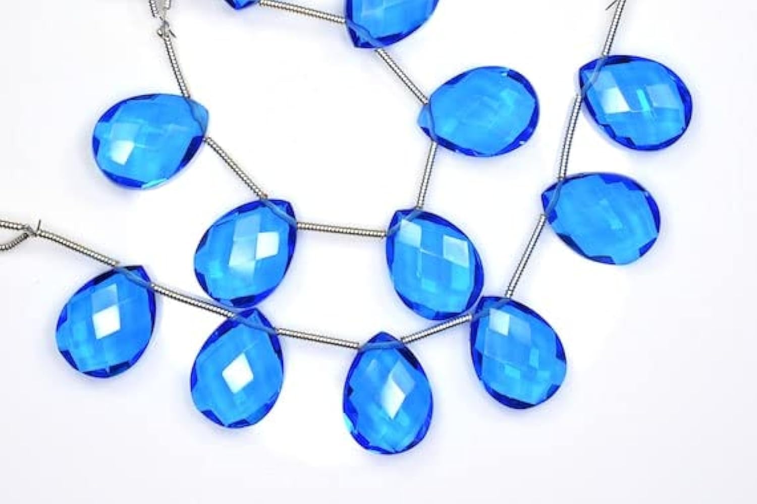Quartz bleu suisse briolette LKBEADS pour réussir vos boucles symétriques