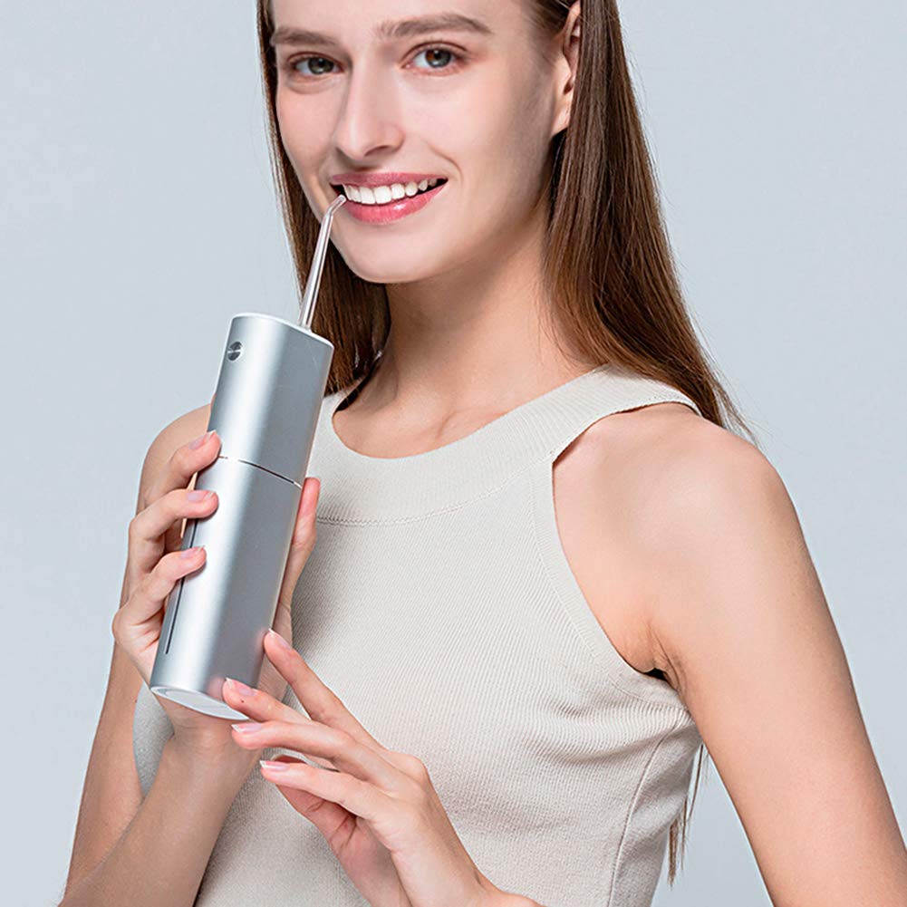 Senza fili professionale con 3 modalità, impermeabile IPX7, ricaricabile tramite USB, include 2 ugelli per una pulizia dentale efficace a casa o in viaggio
