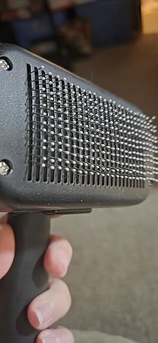 Self-Cleaning Pet Grooming Brush — texture and fabric close-up
