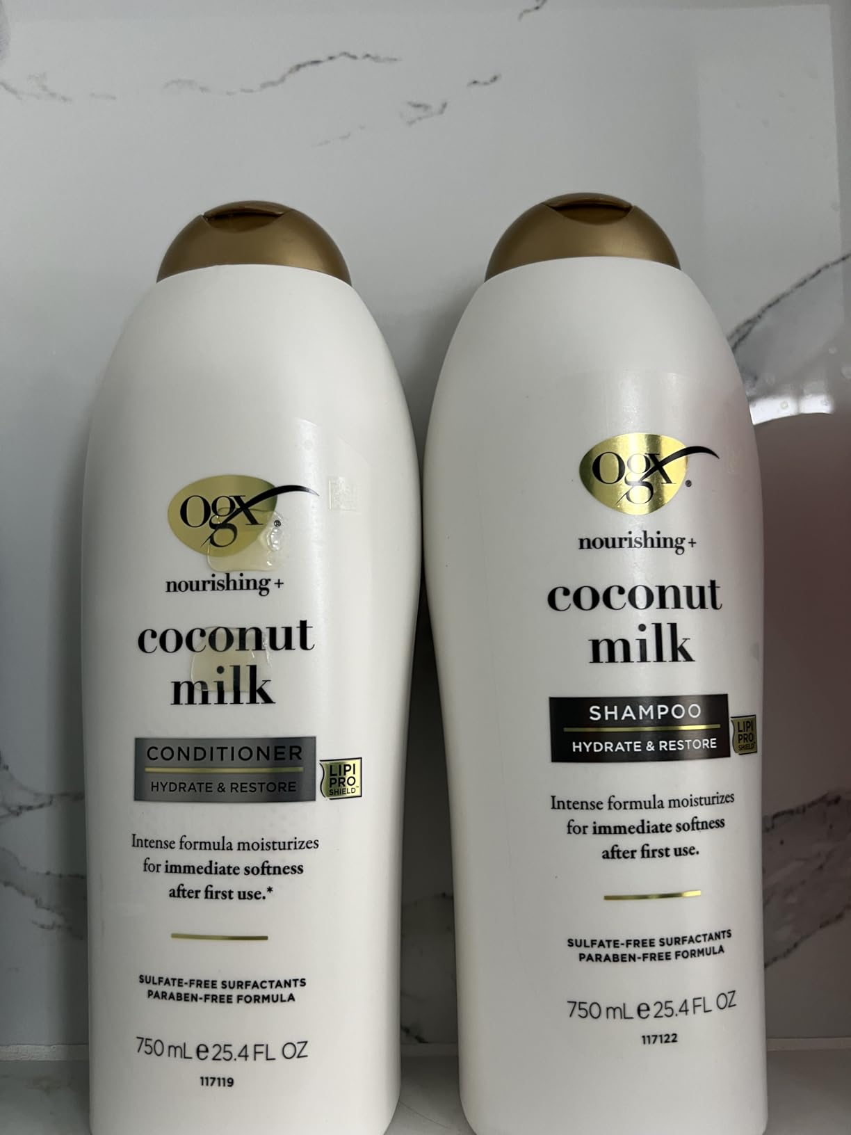 AmazonUs/VOGAL OGX Shampoo and Conditioner Set, Nourishing + Coconut Milk, Shampoo and Conditioner for Moisturizing & Strengthening Hair Care, Formulated without Sulfated Surfactants, 25.4 FL OZ, 2 Pack