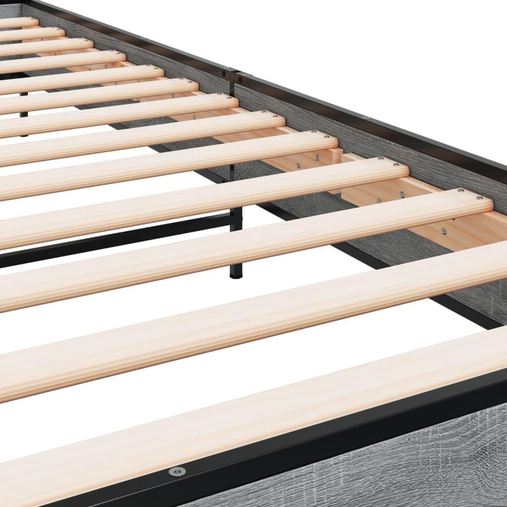 Close-up view of the plywood slats and metal frame support of the vidaXL bed frame