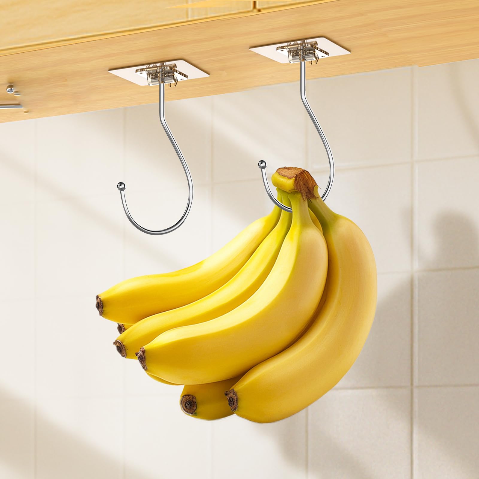 Latoxcaa Self Adhesive Banana Hook Under Cabinet Foldable, 2 Pack Heavy Duty Metal Holder(13lb), Clear Banana Hanger Traceless, Keep Bananas Fresh &amp; Kitchen Space Saving (12cm)