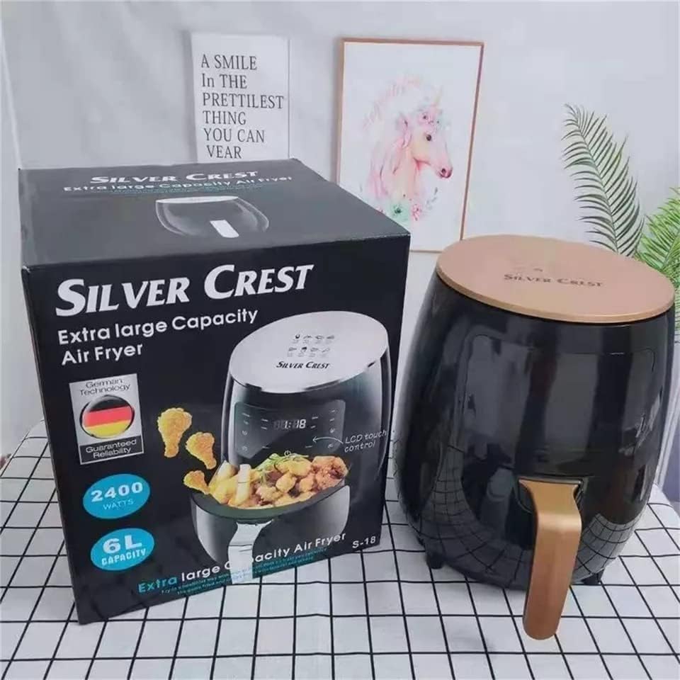 Air fryer next to its retail packaging