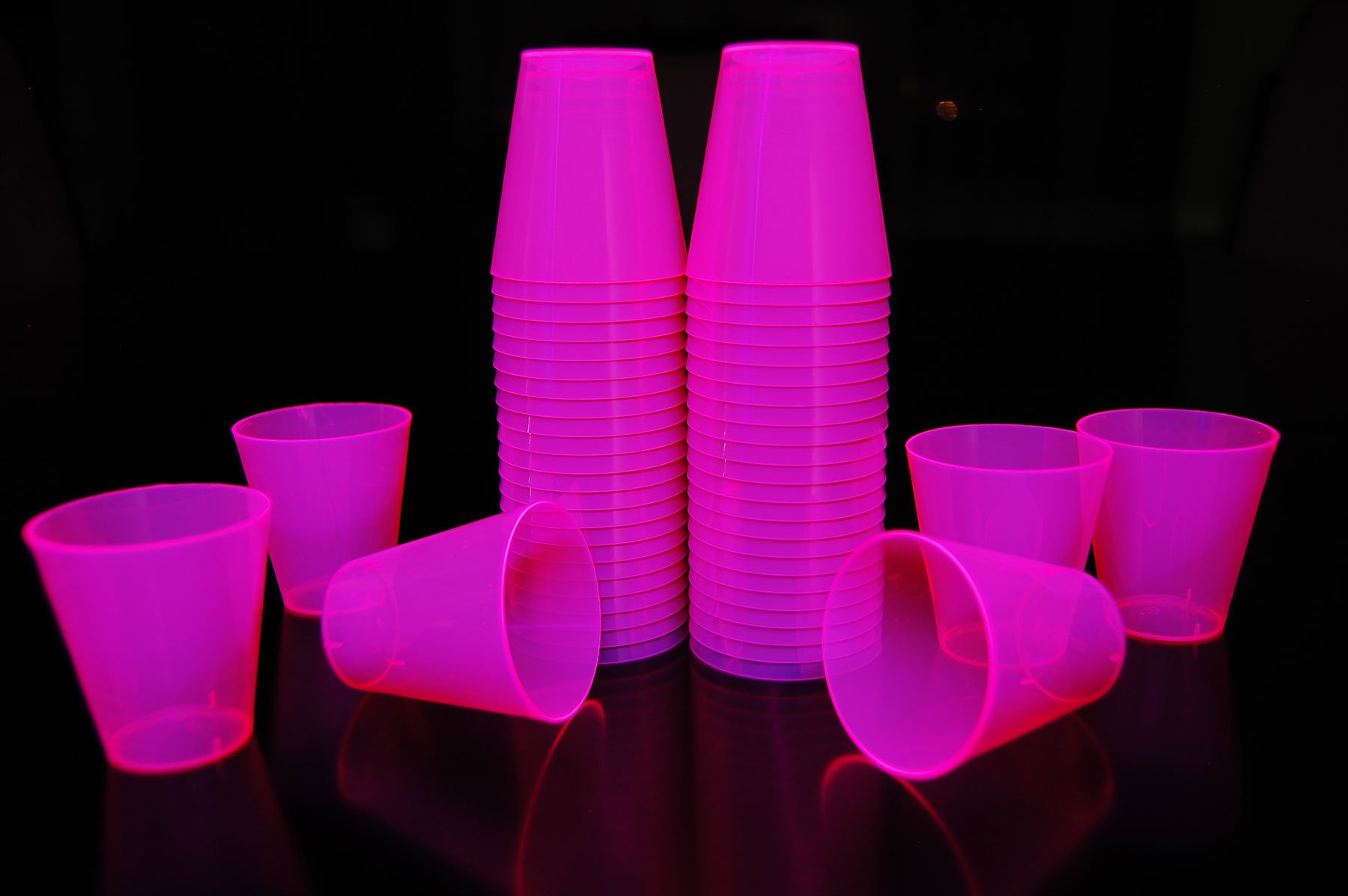 2oz 50 Count Neon Blacklight Reactive Plastic Shot Glasses + 5 Blacklight Balloons (Neon Pink)