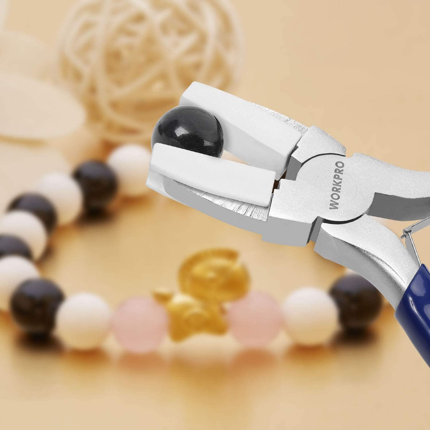 Nylon jaw pliers holding a bead