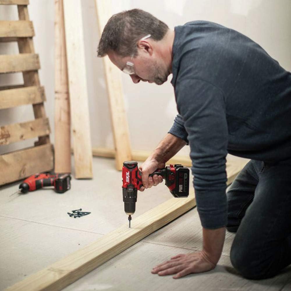 Man using SKIL PWRCore 20 Hammer Drill to drive a screw into wood