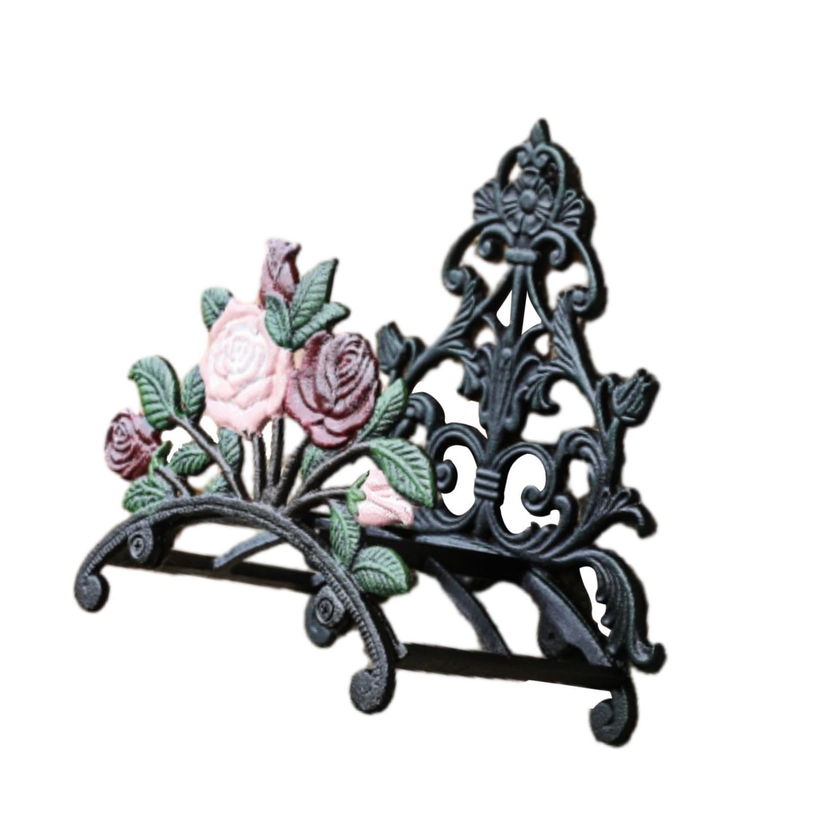 Support de tuyau d'arrosage rose en métal pour sublimer un balcon fleuri