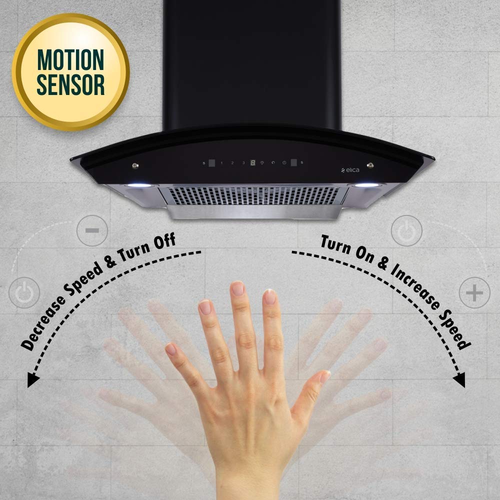 Hand demonstrating motion sensor control on Elica chimney