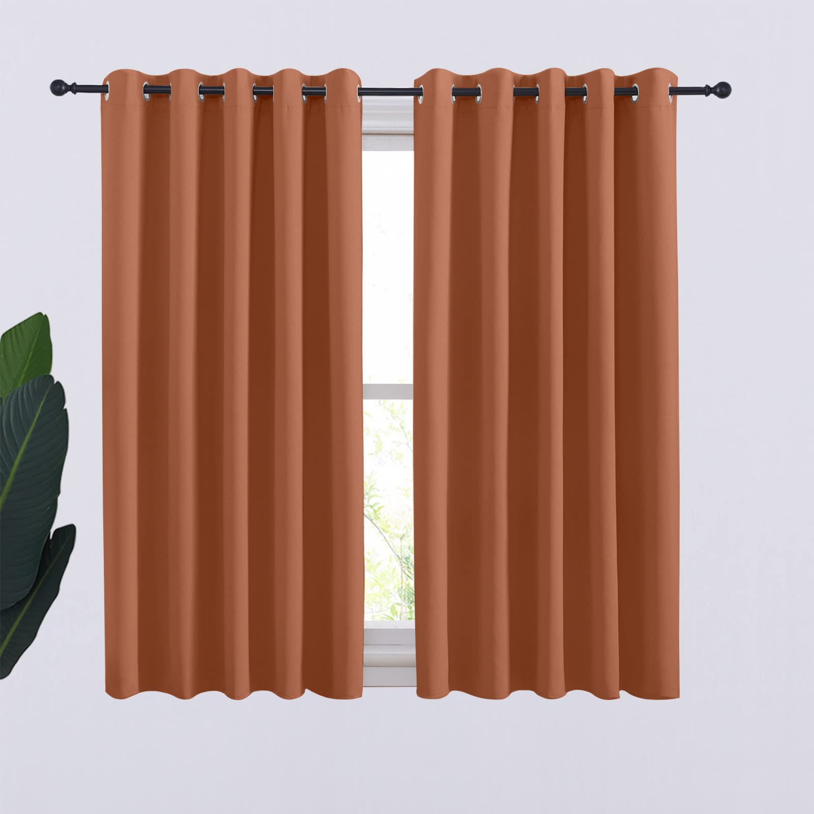 NICETOWN Thermal Insulated Burnt Orange Curtains Blackout Draperies, Window Treatment Solid Grommet Room Darkening Drape Panels for Bedroom (Set of 2, 70 by 54 inches Long)