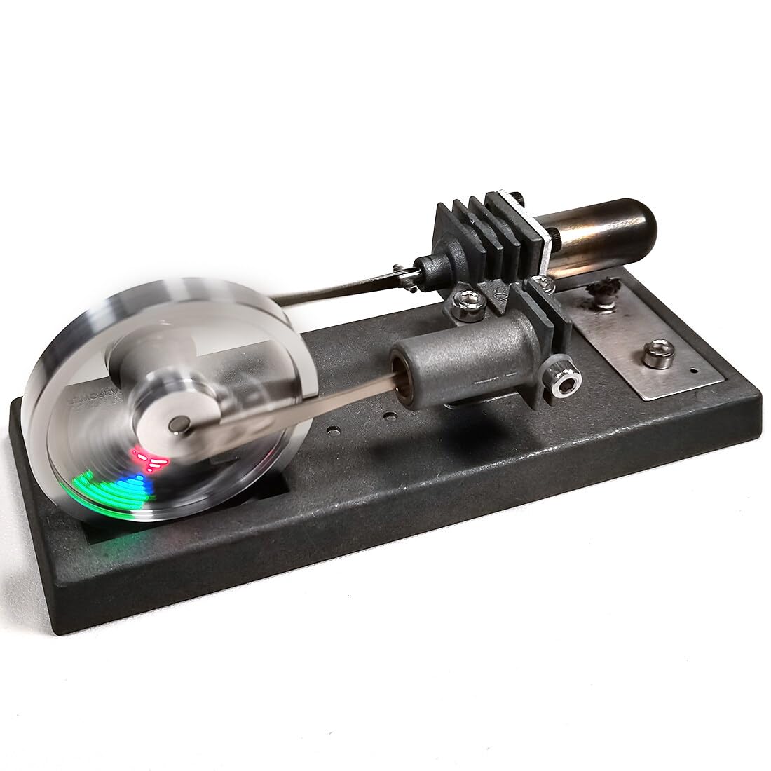 Kit motore Stirling con volano luminoso, 12 × 6 × 6 cm | Il volano luminoso completa il meccanismo autoassemblato con un effetto luminoso visibile.
