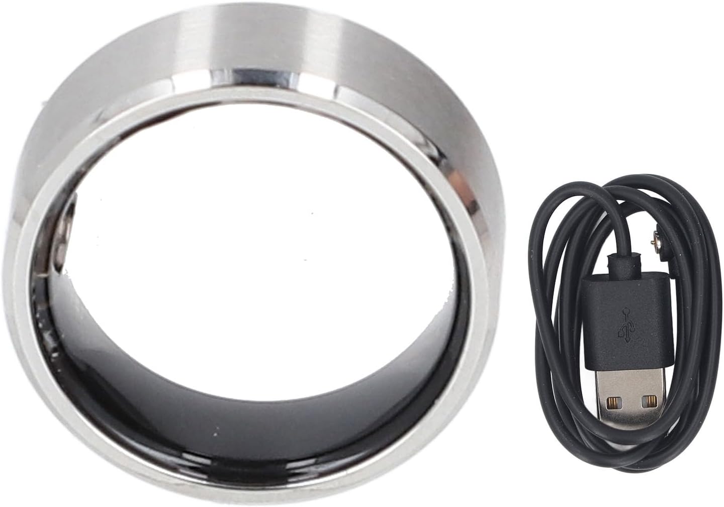 Cuifati Smart Ring next to its USB charging cable.