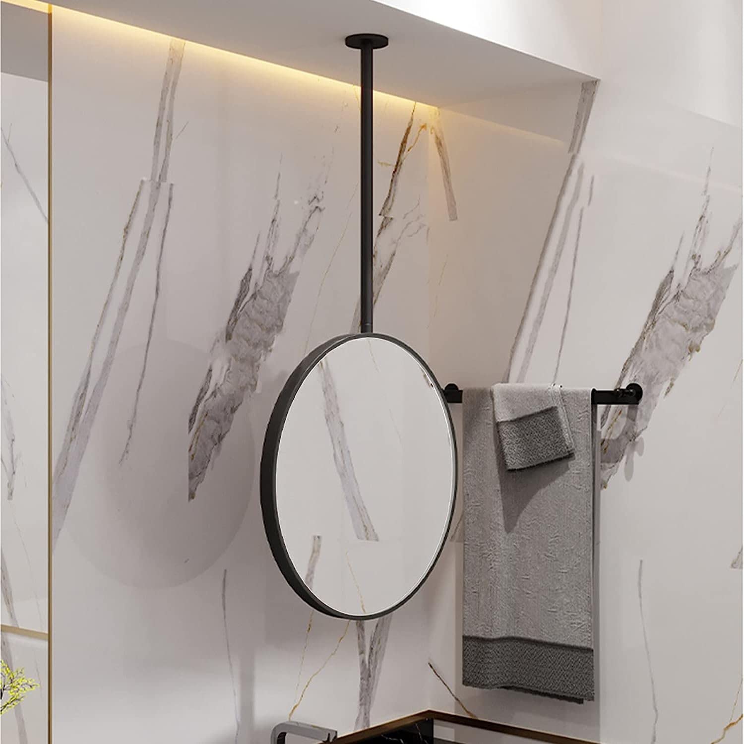 Miroir de salle de bain flottant rond pour agrandir une petite pièce d'eau