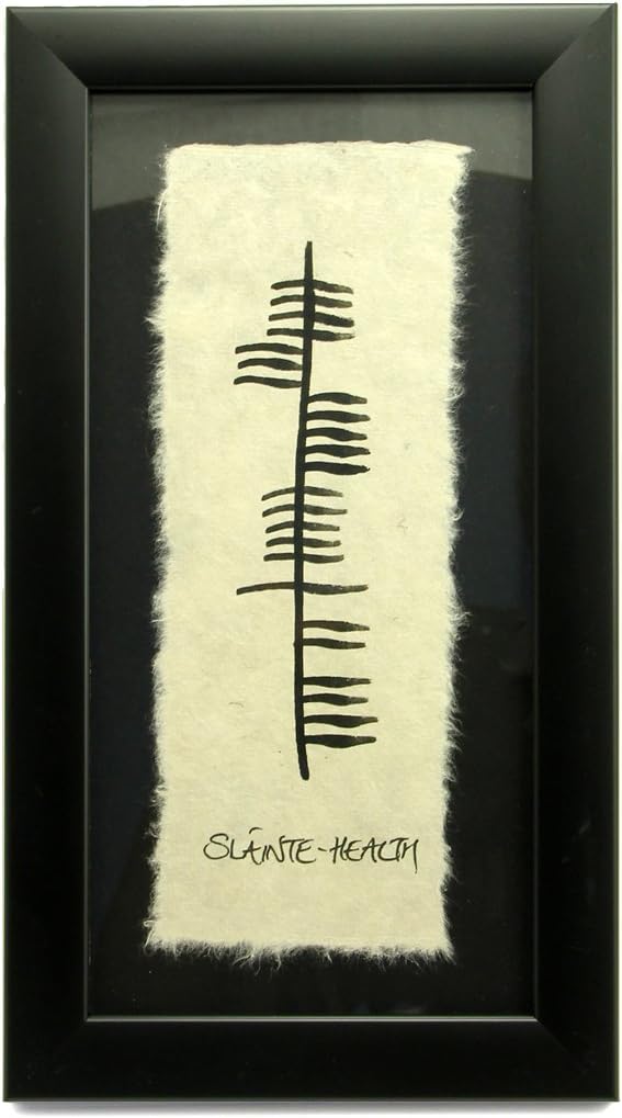 SLAINTE is the Irish Toast for Good Health, Hand Scripted Irish Ogham - Wall Décor, 6 ¼”x 11”, Wide Hanging Black Matted Frame, Elegant Bespoke Feathered Handmade Paper, Celtic Housewarming Gift, Handmade in Ireland | Crafted on Handmade Paper | Featuring the Ogham Script