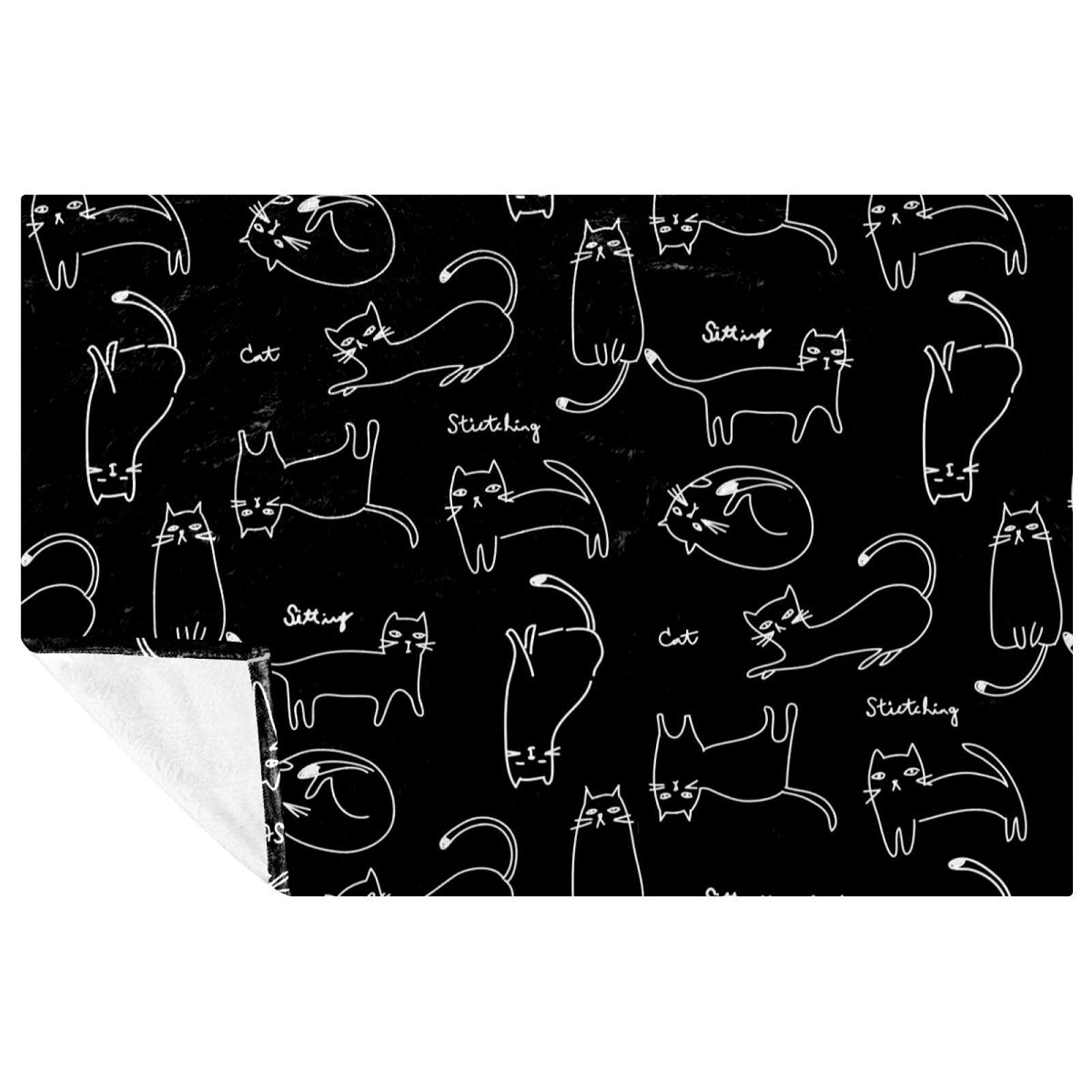 Couverture douce chat contre le froid sur lit et canapé