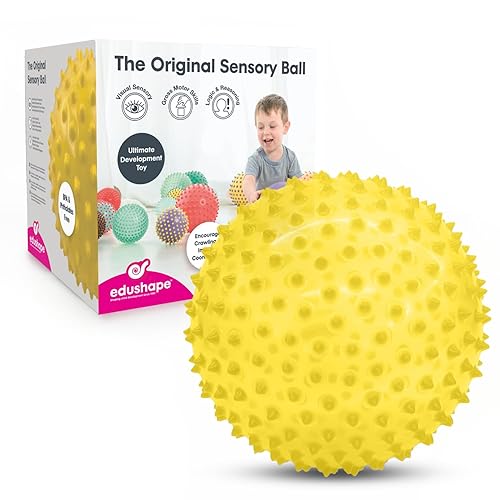 Edushape La bola sensorial original para bebé, bola transparente de 7 pulgadas de color amarillo que ayuda a mejorar las habilidades motoras gruesas
