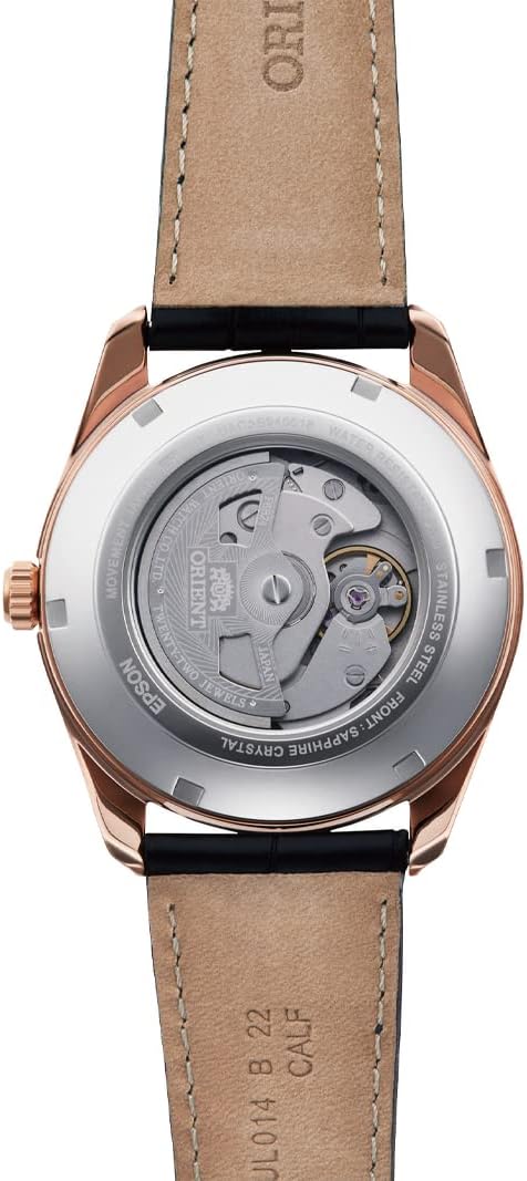 Close-up of Orient RA-AK03 watch's black leather strap and rose gold-tone buckle