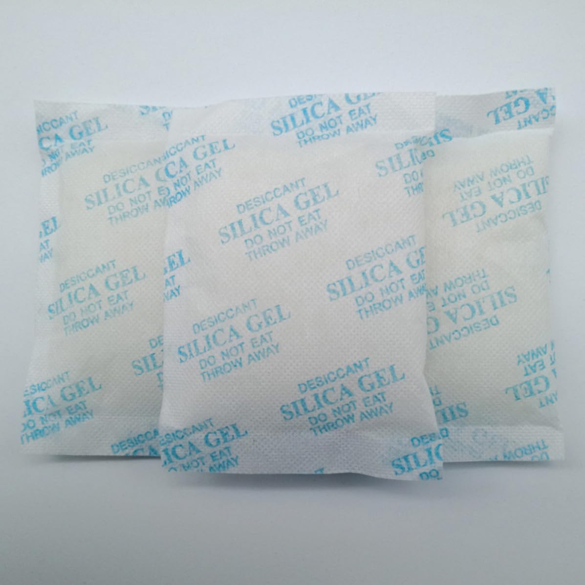 ibasenice 100 Pezzi Bustine di Silice Assorbitore di Umidità da 10g Tessuto Non Tessuto Blu per Armadio e Cassetto Riduce la Condensa e Previene la Corrosione
