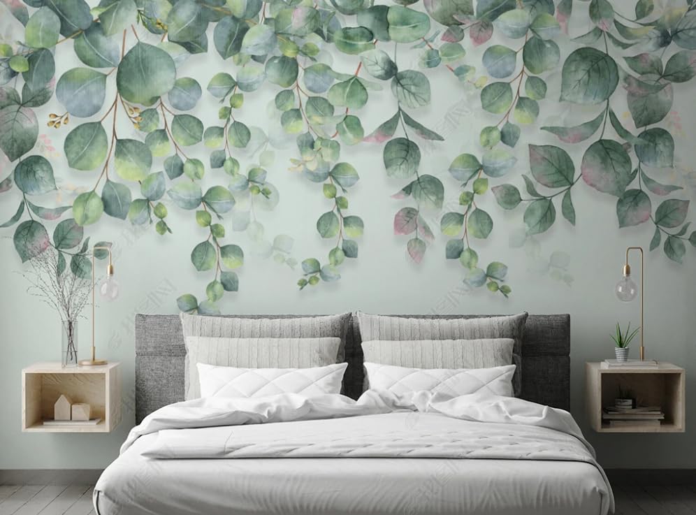 Papier peint intissé avec feuilles vertes pour créer une ambiance nature dans une chambre