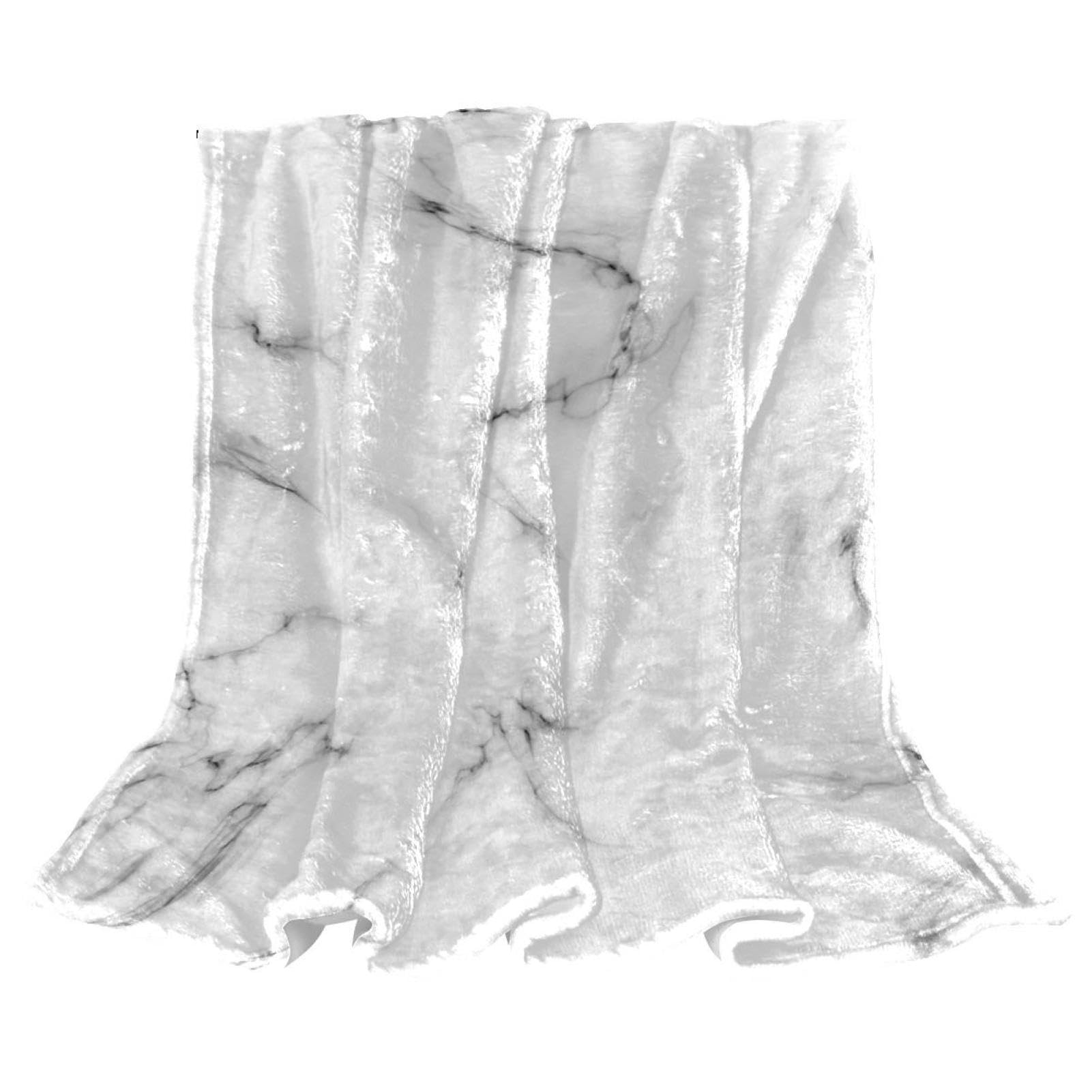 Couverture de canapé marbre blanc pour une ambiance salon cosy