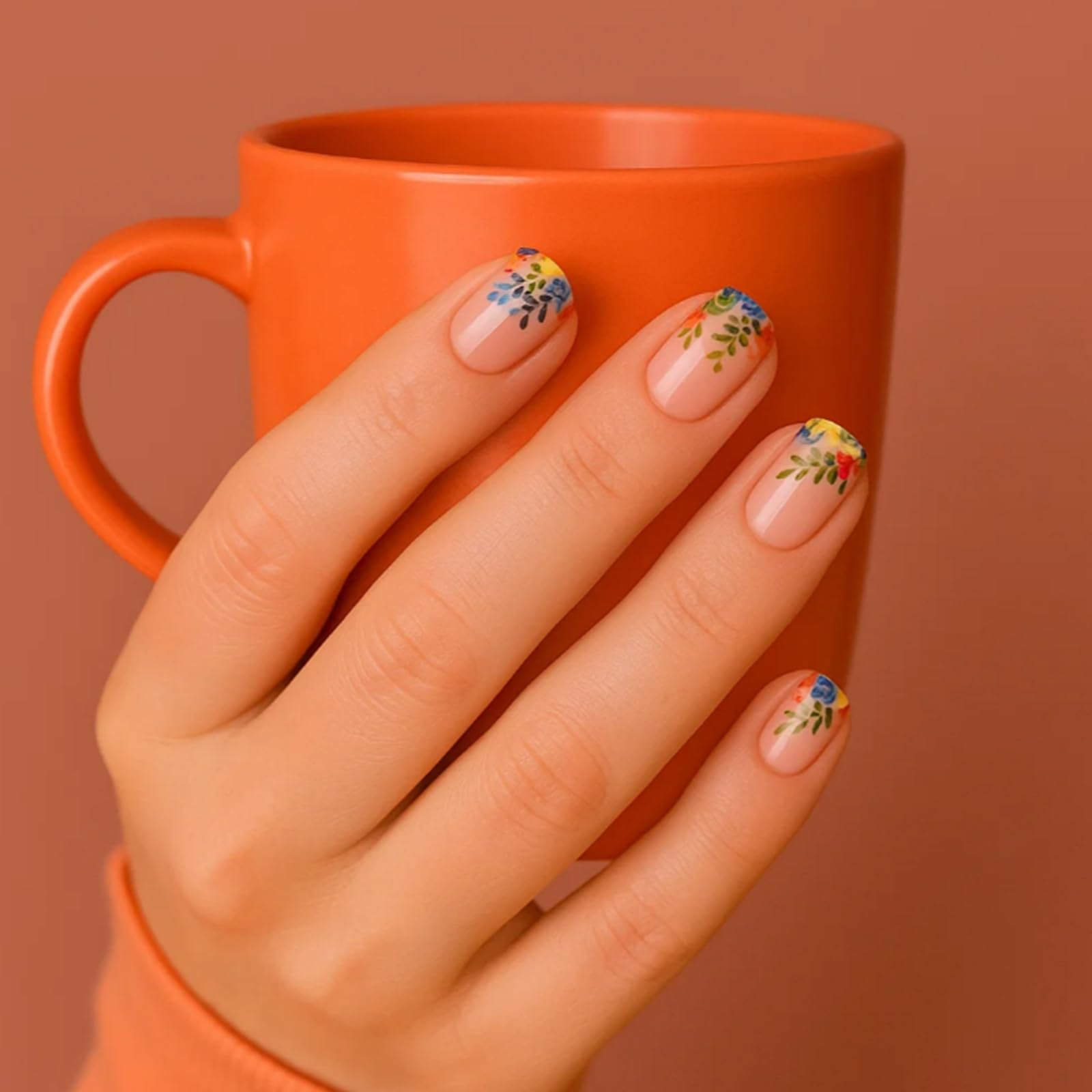 Floral French Press-On Nails with Pastel Pink Base & Colourful Hand-Painted Designs - Image 4
