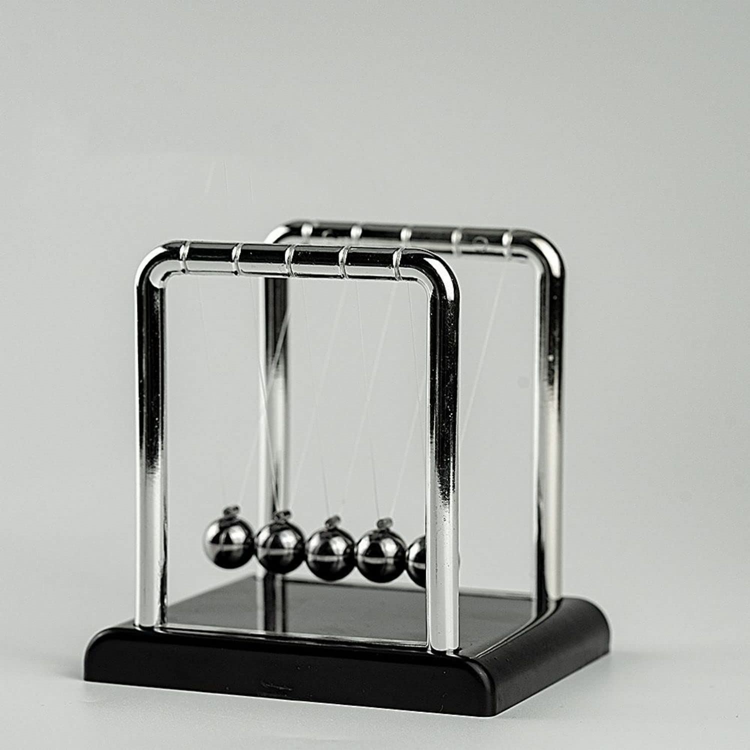 Sponsored Ad – SYOSI Newton's Cradle Balance Ball, Science in Motion Newton Balanced Balls with Balance Swinging Magnetic Balls Funny Pendulum Steel Ball Office Desk Decoration (M, Type 1)