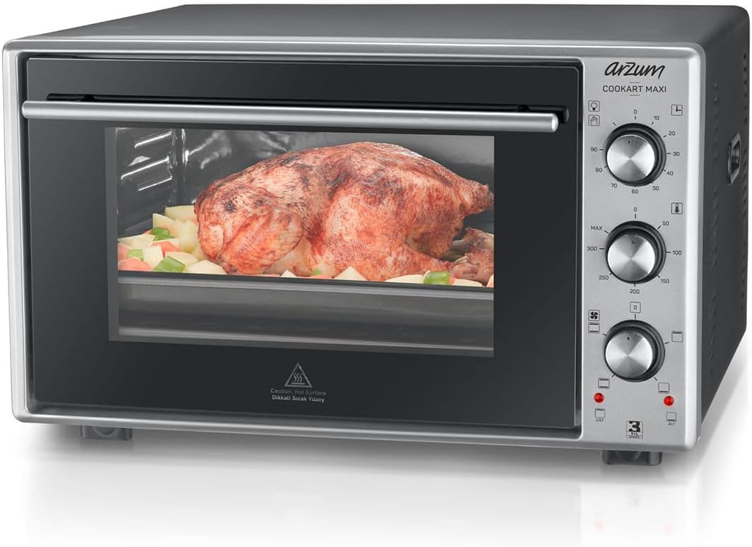 Arzum AR2002 Electric Oven with a whole roasted chicken inside