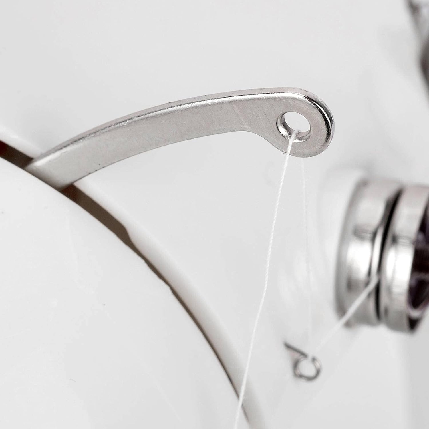 Close-up of thread cutter on FROSAB FHSM-201 Sewing Machine