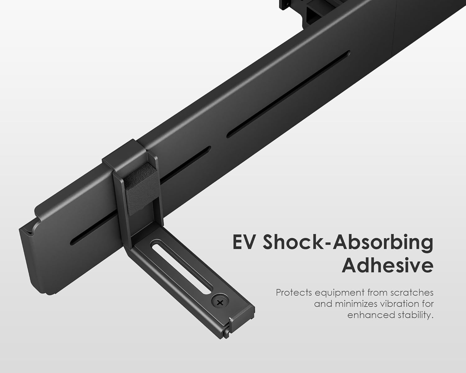 Close-up of EV shock-absorbing adhesive pads on soundbar support