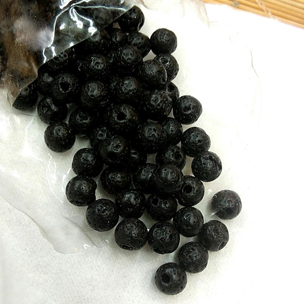 Perles de pierre de lave noire authentique pour création de bijoux artisanaux de luxe