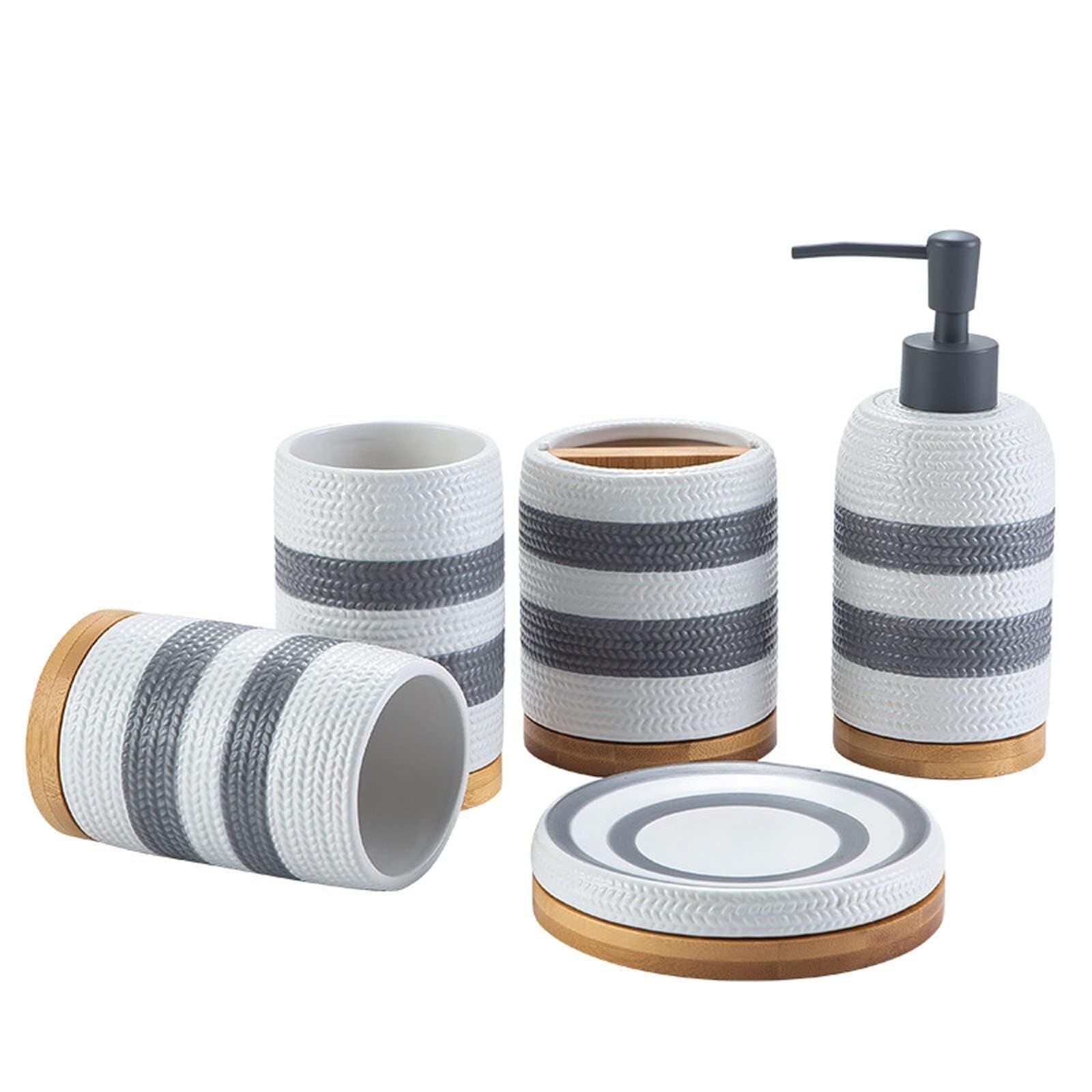 Set di accessori per il bagno Set di accessori for il bagno moderno con dispenser, portasapone, portaspazzolino e bicchiere Arredamento per gli affittuari