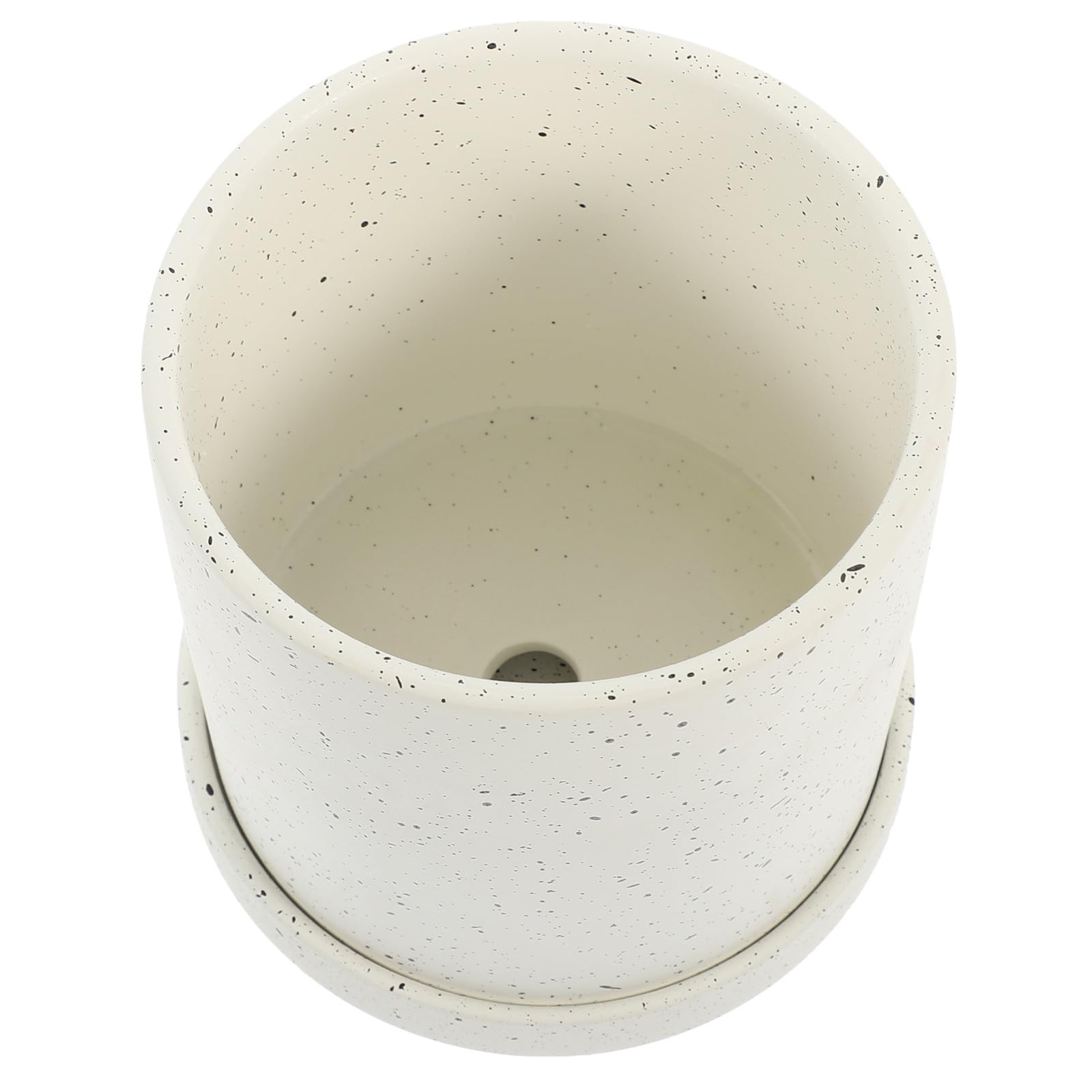 Pot de fleurs en céramique blanc avec trou de drainage contre l'excès d'eau