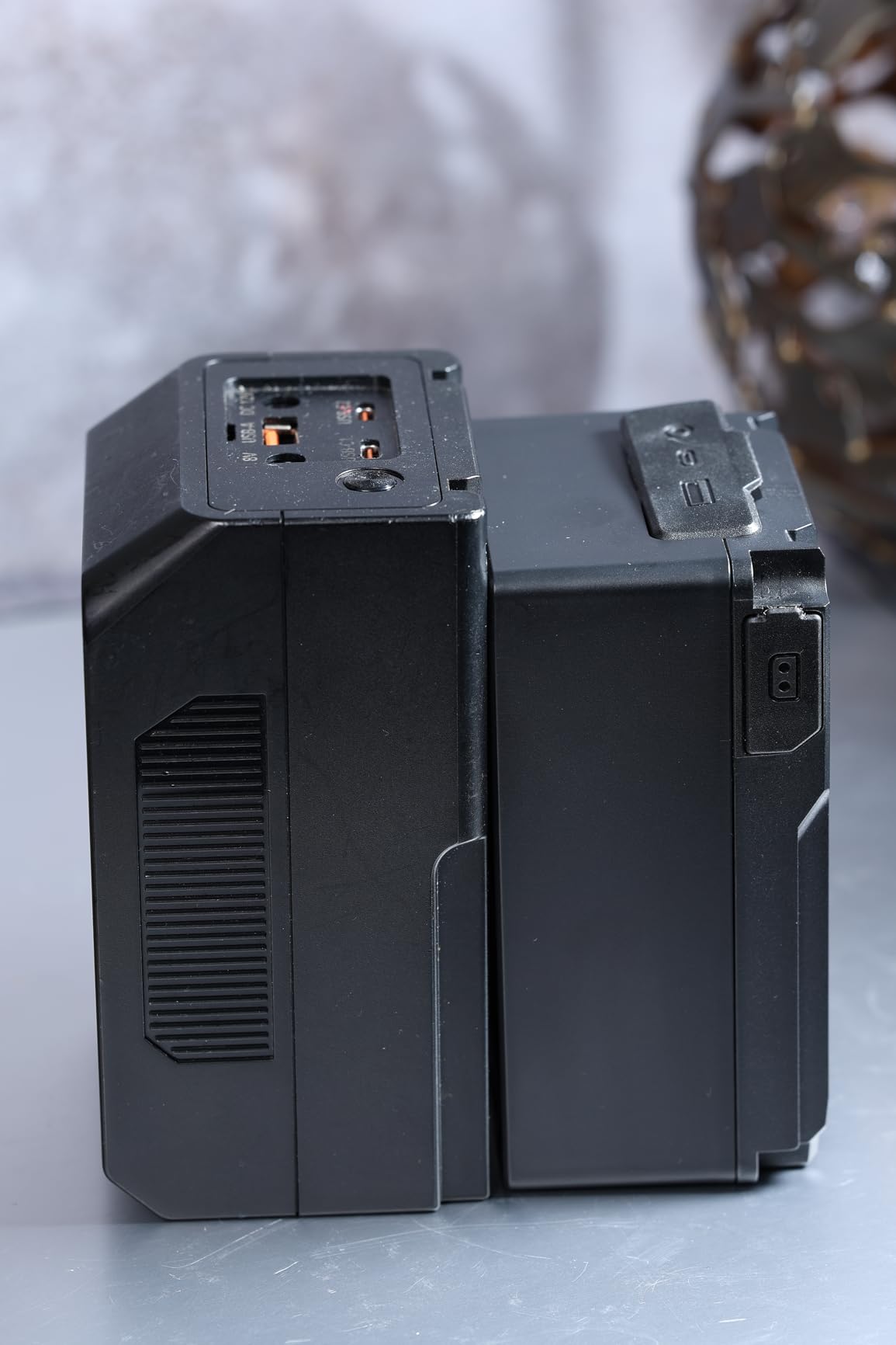 One of the smaller v99 size wise. Works great. Light is useful. 90 degree USB C kind of sucks.