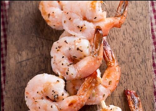 New York Steak & Seafood Wild-Сaught Shrimp - Frozen Fresh Wild-caught Shrimp - Wild Caught Uncooked Shrimp - 32 oz. Colossal (approx. 24 Shrimps) Tail Off