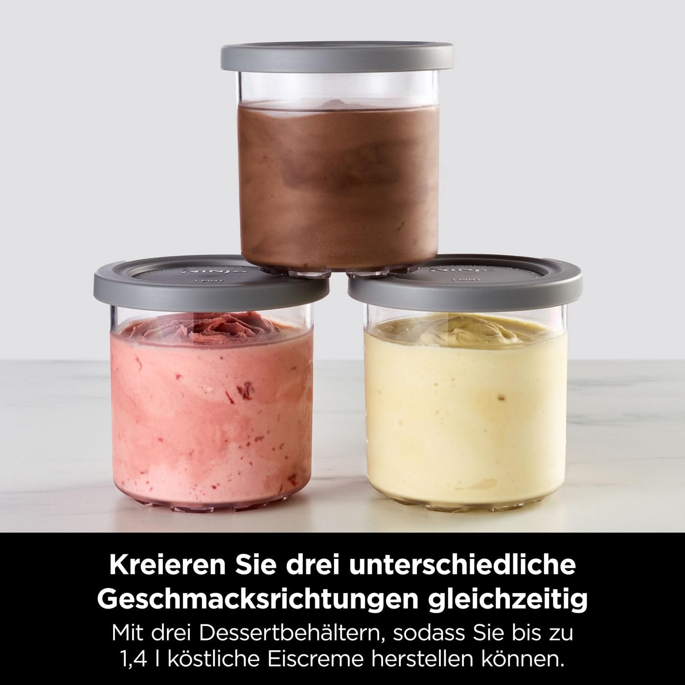 Ninja CREAMi Eismaschine & Frozen Dessert Maker mit 3 Behältern, 7 Programmen, macht Eiscreme, Gelato, Sorbet, Smoothie Bowl, Milchshakes und mehr, macht 1,4 L Eiscreme, Schwarz & Kupfer, NC300EUCP